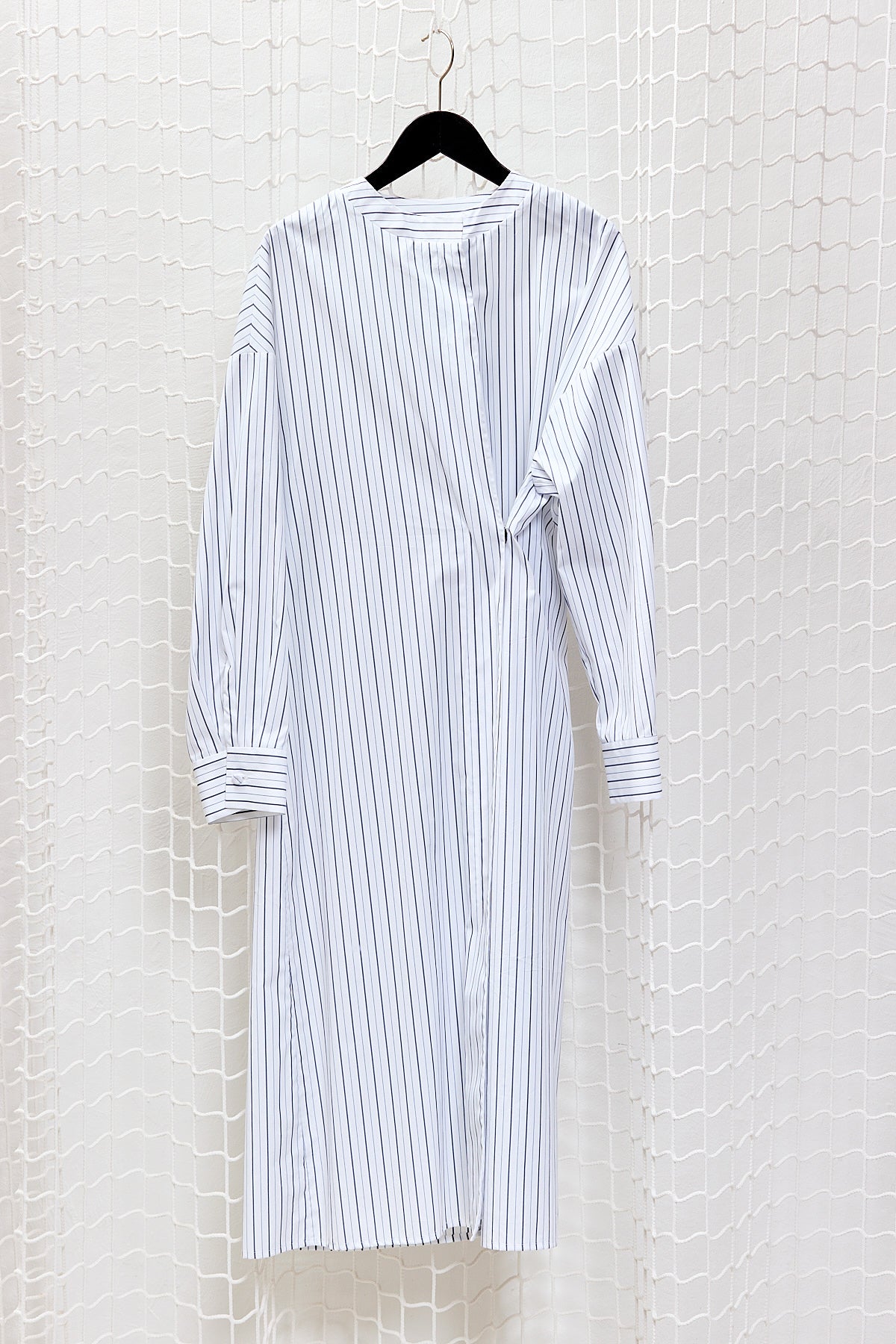 ASYMMETRICAL CLOSING LONG SHIRT