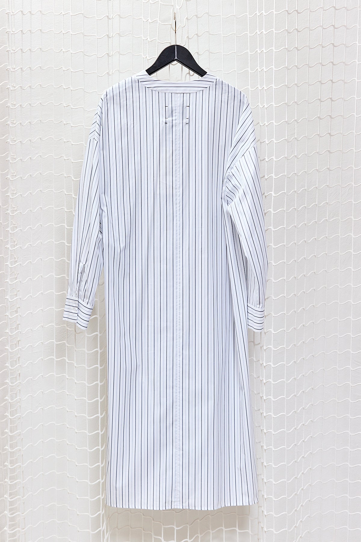 ASYMMETRICAL CLOSING LONG SHIRT